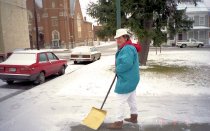 Jeannette Ewing shoveling snow